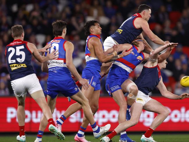 Steven May rises over a pack to spoil. Picture: Darrian Traynor/Getty Images