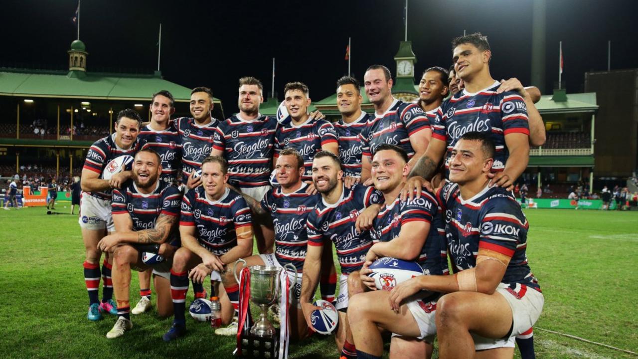 The Roosters celebrate after winning the Anzac Cup Trophy