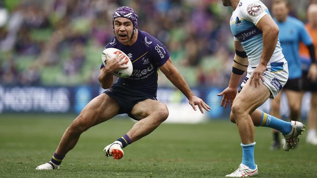 Jahrome Hughes of the Storm runs with the ball during the round 26 NRL match between Melbourne Storm and Gold Coast Titans at AAMI Park on August 26, 2023 in Melbourne, Australia. (Photo by Daniel Pockett/Getty Images)