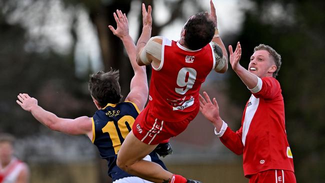 Glenroy’s Jacob Grigg attempts a screamer. Picture: Andy Brownbill