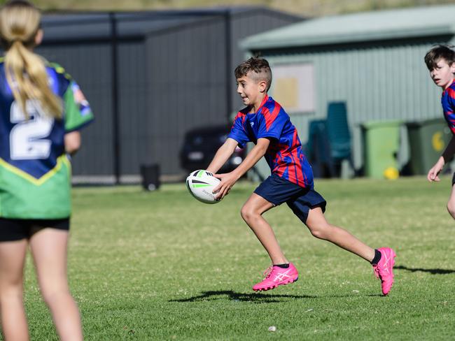 Hunter on the move for Harristown State School Red in the inaugural Primary Interschools Reconciliation Touch Carnival hosted by Glenvale State School, Wednesday, May 28, 2025. Picture: Kevin Farmer