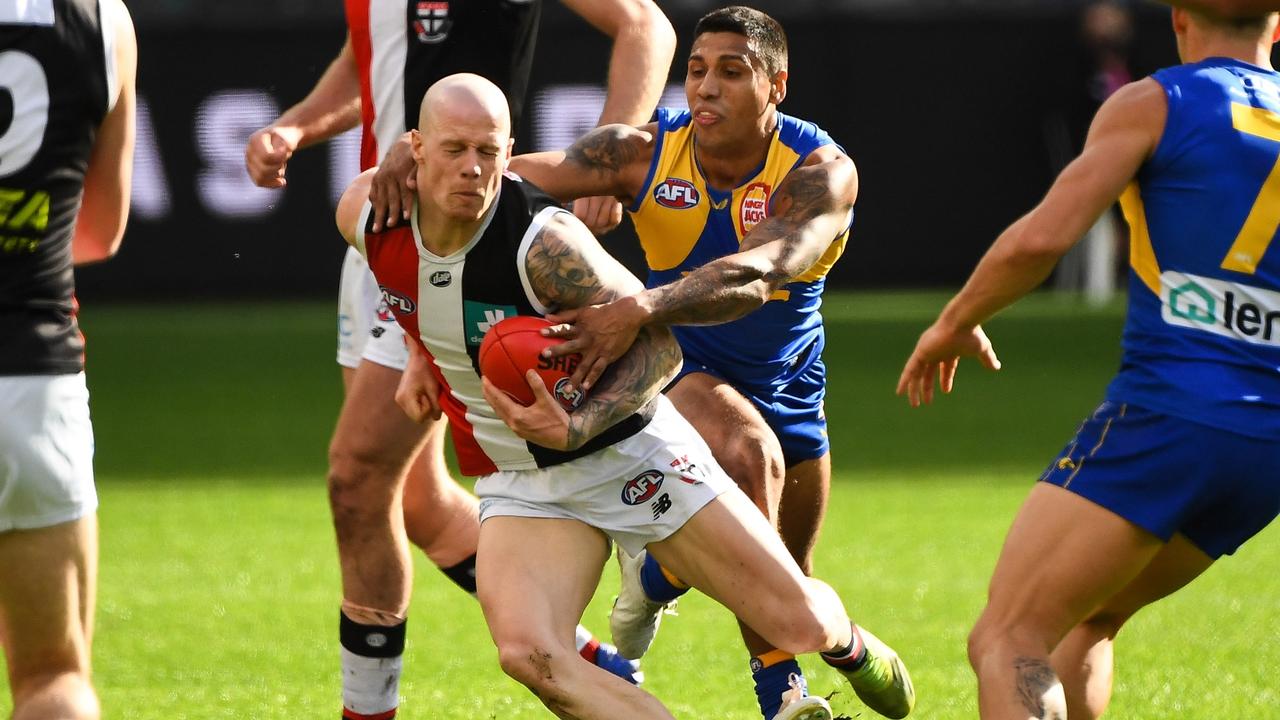 PERTH, AUSTRALIA - JULY 24: Zak Jones of the Saints is tackled by Tim Kelly of the Eagles during the 2021 AFL Round 19 match between the West Coast Eagles and the St Kilda Saints at Optus Stadium on July 24, 2021 in Perth, Australia. (Photo by Daniel Carson/AFL Photos via Getty Images)