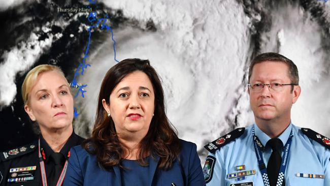 Queensland Fire and Emergency Services Commissioner, Katarina Carroll (left), Queensland Premier Annastacia Palaszczuk (centre) and Queensland Police Deputy Commissioner Bob Gee. PICTURE: AAP Image/Darren England