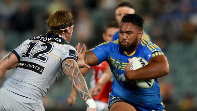 Junior Paulo of the Eels runs at Ethan Lowe of the Cowboys during their round 2 NRL match between the Parramatta Eels and the North Queensland Cowboys at Pirtek Stadium in Parramatta Sydney, Saturday, March 12, 2016. (AAP Image/Brendan Esposito) NO ARCHIVING, EDITORIAL USE ONLY