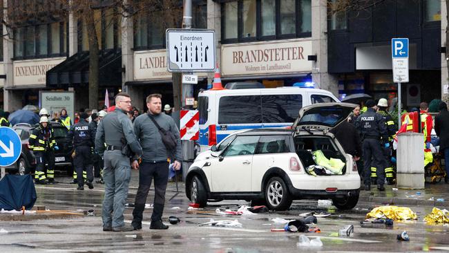 The aftermath of a suspected car ramming attack into a group of people walking in a union street protest. Picture: Michaela Stache / AFP