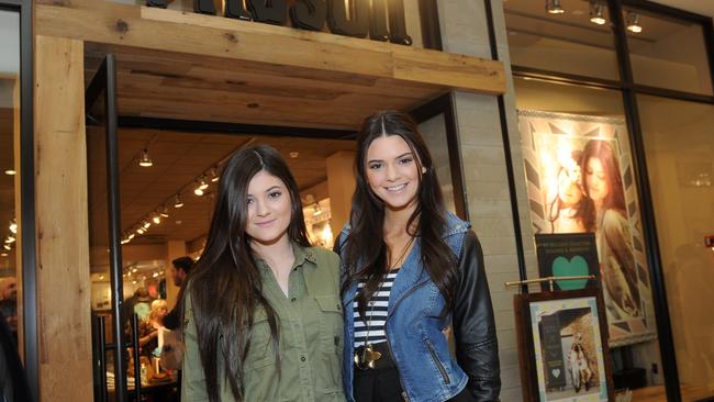 Kylie and Kendall Jenner both looked markedly different as youngsters as they do now as adults. Picture from Getty.