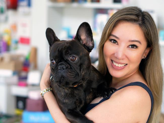 Packaging entrepreneur Nina Nguyen, of Queensland-based Pakko, with dog Buddy.