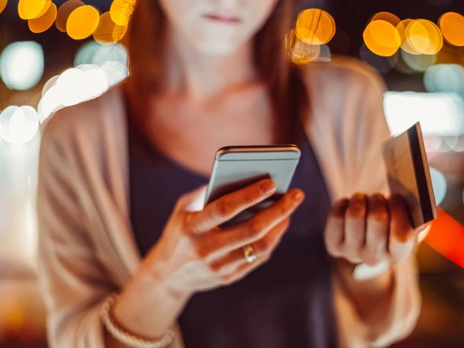 Young woman phoning the bank for credit card support   istock image