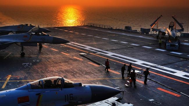 Chinese F-15 ‘Flying Shark’ fighters on the deck of the aircraft carrier Liaoning. Picture: PLA