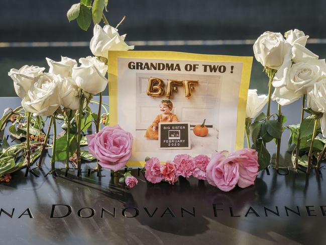 Flowers and mementos are left at the National September 11 Memorial on the 18th anniversary of the 9/11 attacks. Picture: AP