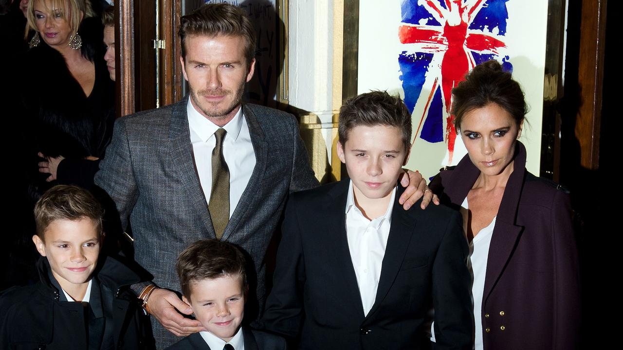 Craig Ainsworth protected the entire Beckham family, including children, Romeo (left), Cruz (centre) and Brooklyn (right). Photo by Leon NEAL / AFP)