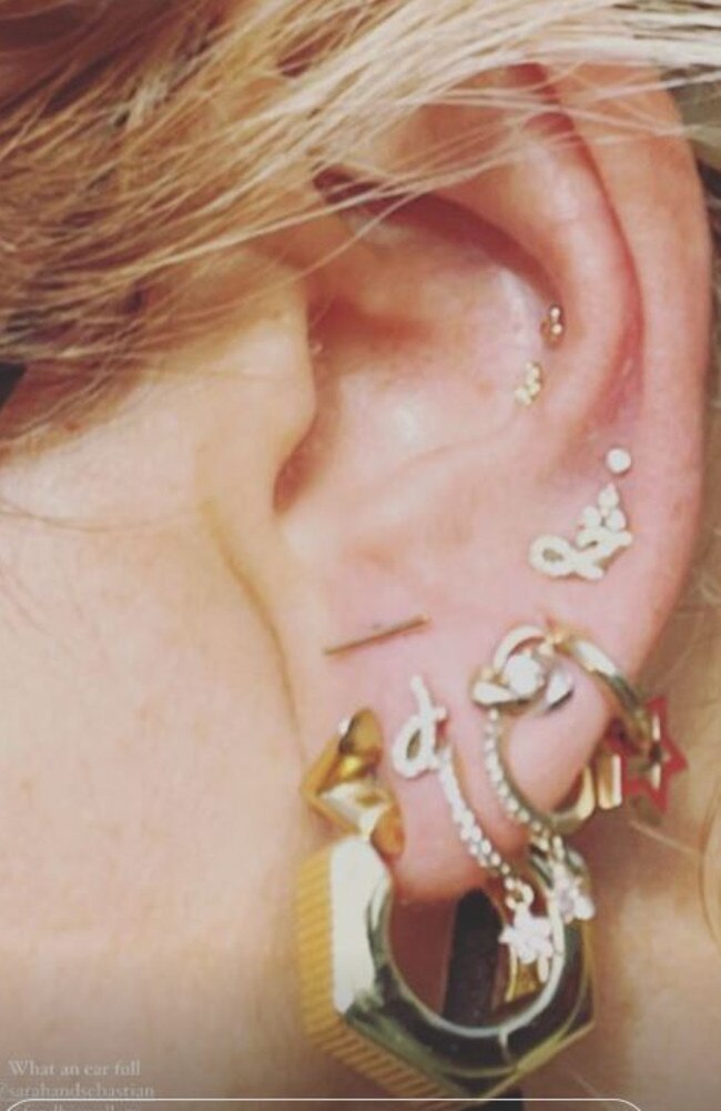 Pip Edwards shared a close-up snap of her ‘ear full’ of piercings. Picture: Instagram/Pipedwards