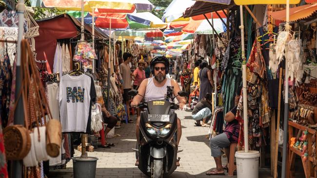 Road rules and use of hired scooters by tourists is also an issue for locals. Picture: Getty Images