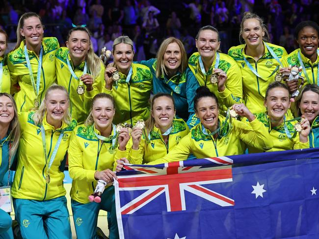 BIRMINGHAM, ENGLAND - AUGUST 07: Gold Medallists Team Australia celebrate during the Netball Medal Ceremony on day ten of the Birmingham 2022 Commonwealth Games at NEC Arena on August 07, 2022 on the Birmingham, England. (Photo by Stephen Pond/Getty Images)