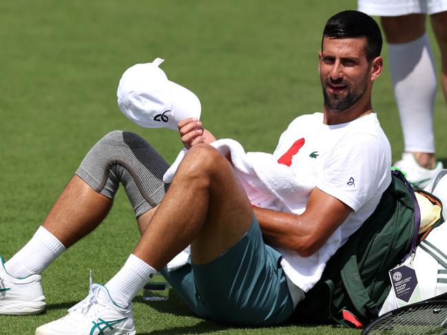 LONDON, ENGLAND - JUNE 29: Novak Djokovic of Serbia reacts during practice prior to The Championships Wimbledon 2024 at All England Lawn Tennis and Croquet Club on June 29, 2024 in London, England. (Photo by Clive Brunskill/Getty Images)