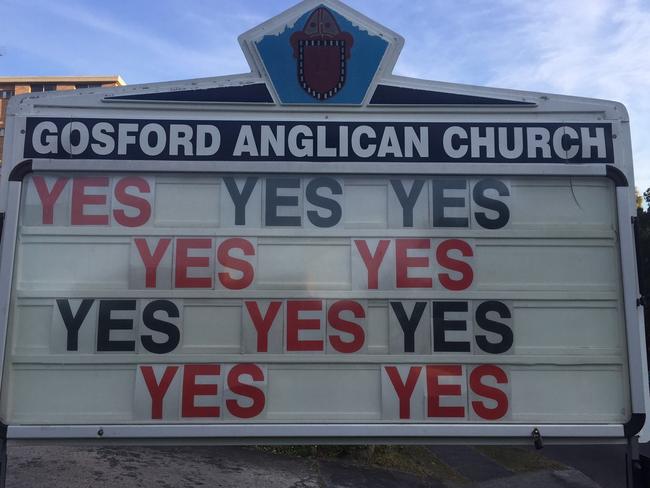 Father Rod Bower’s latest sign out the front of Gosford Anglican Church makes it clear where his support lies. Picture: Supplied