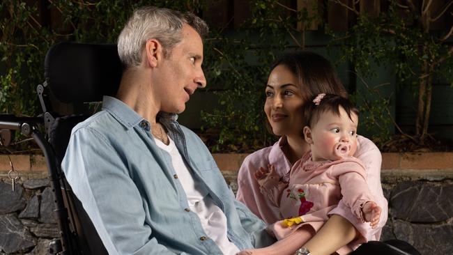 Johnny with his wife Sherie and their daughter Riley. Picture: David Kelly.