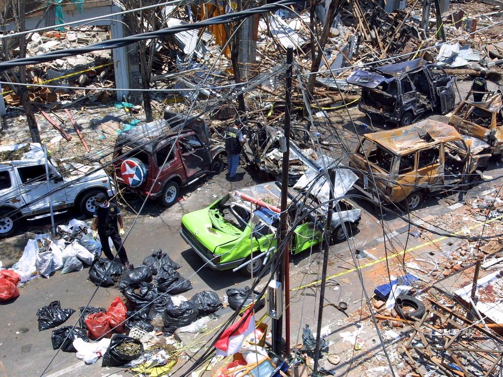 Police at the site of the bombing, four days after the attack. Picture: Getty