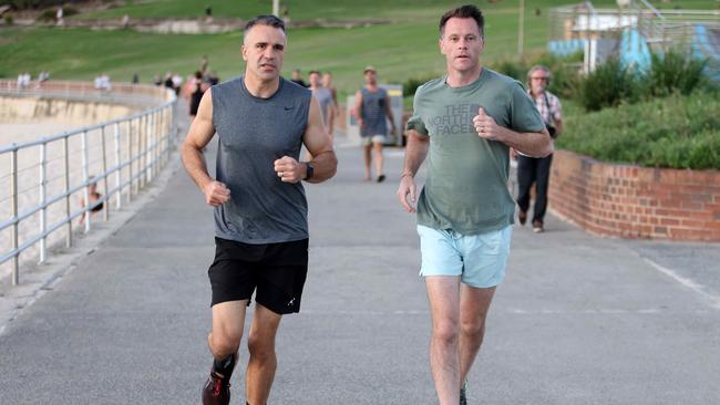 SA Premier Peter Malinauskas and NSW Labor leader Chris Minns go for a run at Bondi Beach on Thursday. Picture: NCA NewsWire / Damian Shaw