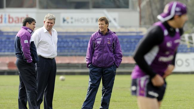 Brian Waldron during happier times at the Storm, alongside football manager Frank Ponissi and coach Craig Bellamy.