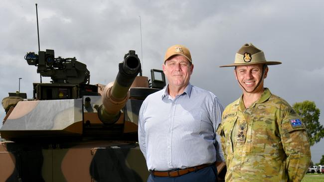 Northern Australia AIG head Dean Deighton and Commanding Officer 3rd Brigade Brigadier Ben McLennan with a new M1A2 Abrams SEPv3 main battle tank at Lavarack Barracks. Picture: Evan Morgan