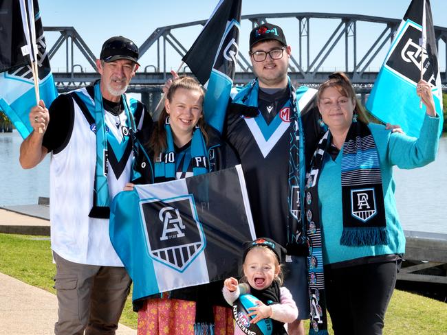 The family of PortÃs Brandon Zerk-Thatcher, flying the Power colours in Murray Bridge. 2 year old niece Scarlett, along with from left, Shane Elphick (Stepfather), Shelby Elphick, (Sister and ScarlettÃs mum), Jayden Elphick-Thatcher, brother), and BrandonÃs mum, Karen Elphick. 17 September 2024. Picture: Dean Martin