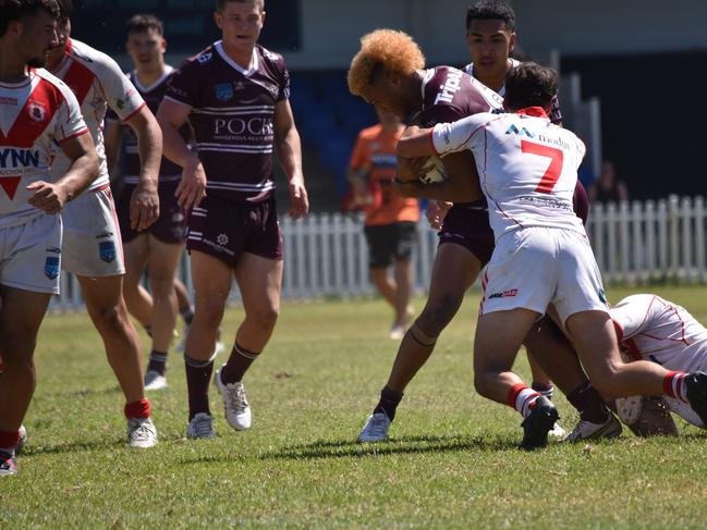 Latu Fainu takes on the line. Picture: Sean Teuma/NewsLocal