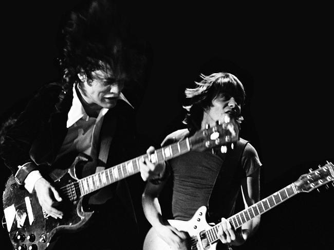 Angus Young and Malcolm Young from AC/DC.