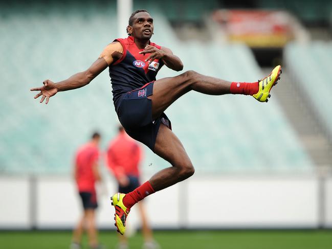 Melbourne training. MCG. Liam Jurrah gets a kick away.