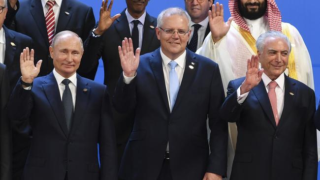 Australian Prime Minister Scott Morrison stands in the centre with Russian President Vladimir Putin, left, during the family picture at the G20 summit in November. Picture: AAP