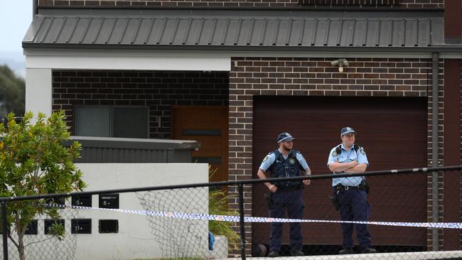 Police at the Condell Park crime scene on Monday. Picture: Jeremy Piper