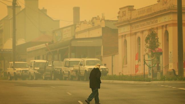 Heavy smoke and low visibility on the main street of Orbost. Picture: Mark Stewart