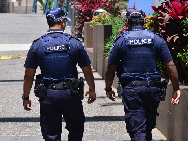 Gold Coast, Australia - October 28, 2014: Police officers patrol the streets in Surfers Paradise. Gold Coast police on high terror alert warned to be hyper vigilant and patrol local mosques and critical infrastructure sites