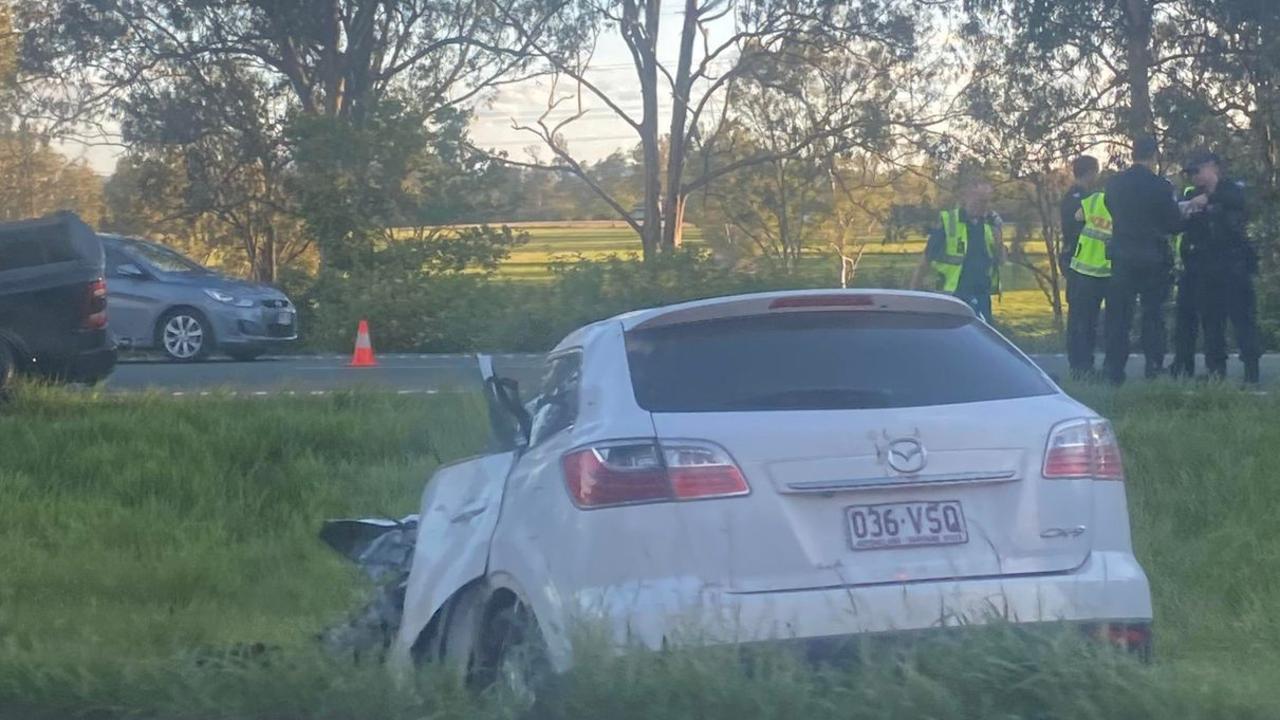 The driver of this Mazda allegedly failed to stop before police before colliding with another vehicle and bursting into flames. Picture: Katelyn Martin