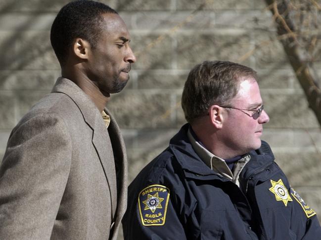 LA Lakers star Kobe Bryant leaves a Colorado court in 2004