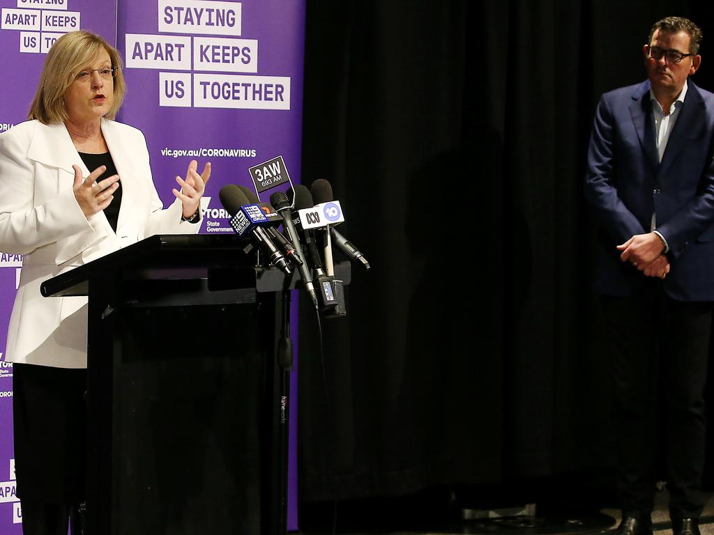 With Victorian Premier Daniel Andrews looking on, Victorian Police Minister Lisa Neville speaks at a press conference in 2020. Picture: NCA NewsWire / Ian Currie