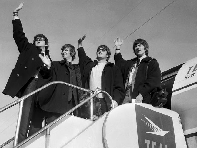 Making waves... The Beatles leave Sydney after their tour in 1964. 