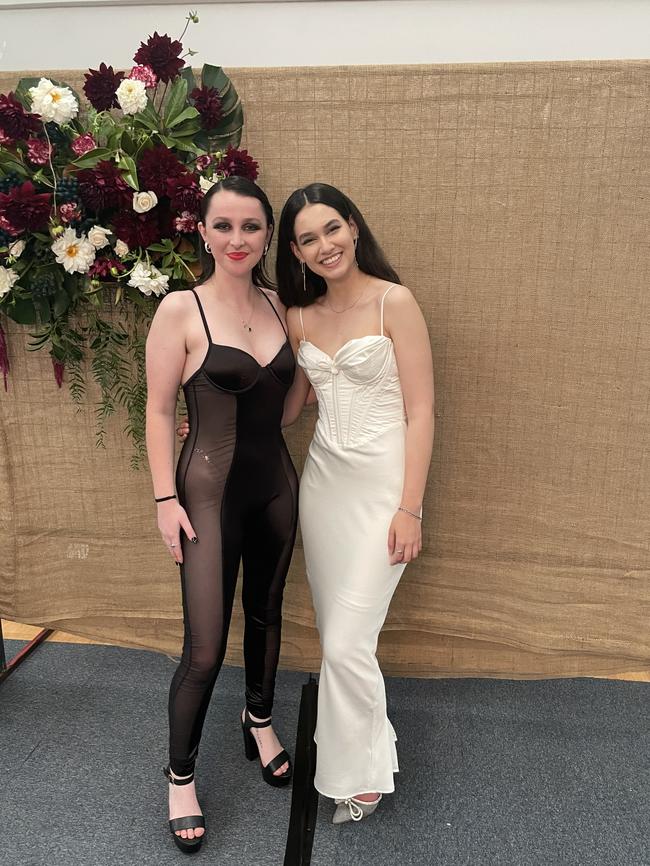 Good friends Amity James and Ella Park looking stylish and cool at their formal.