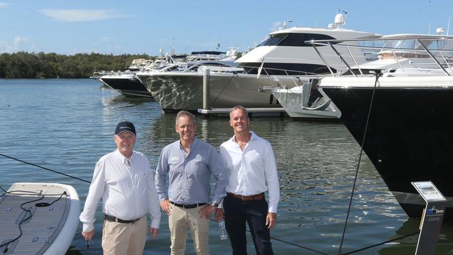 The city and country’s two biggest boat builders — Sanctuary Cove show stalwart Bill Barry-Cotter (left) and Riviera’s Rodney Longhurst joined Mr Hassar (centre) in the build-up to the show 30th later this month.