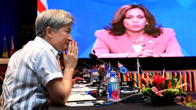 Foreign Minister Penny Wong listens in as US Vice-President Kamala Harris speaks via video-link to the Pacific Islands Forum on Wednesday. Picture: AFP)