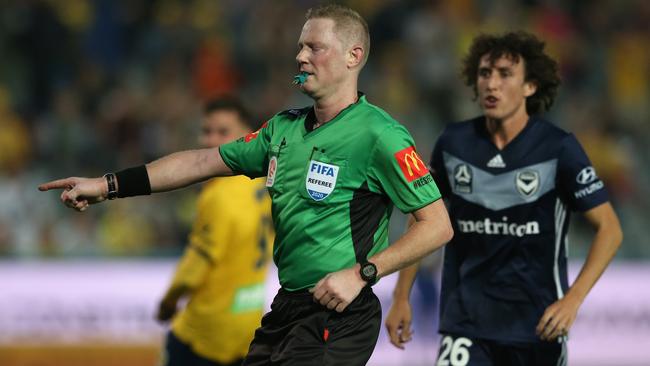 Referee Kurt Ams awards a penalty to the Mariners during their Round 14 A-League match against Melbourne Victory in Gosford. Picture: Getty Images