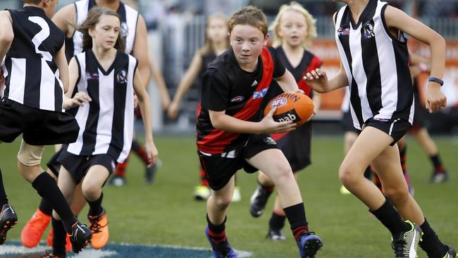 MELBOURNE, AUSTRALIA - APRIL 25: General Auskick action during the 2019 AFL round 06 ANZAC Day match between the Essendon Bombers and the Collingwood Magpies at the Melbourne Cricket Ground on April 25, 2019 in Melbourne, Australia. (Photo by Dylan Burns/AFL Photos)