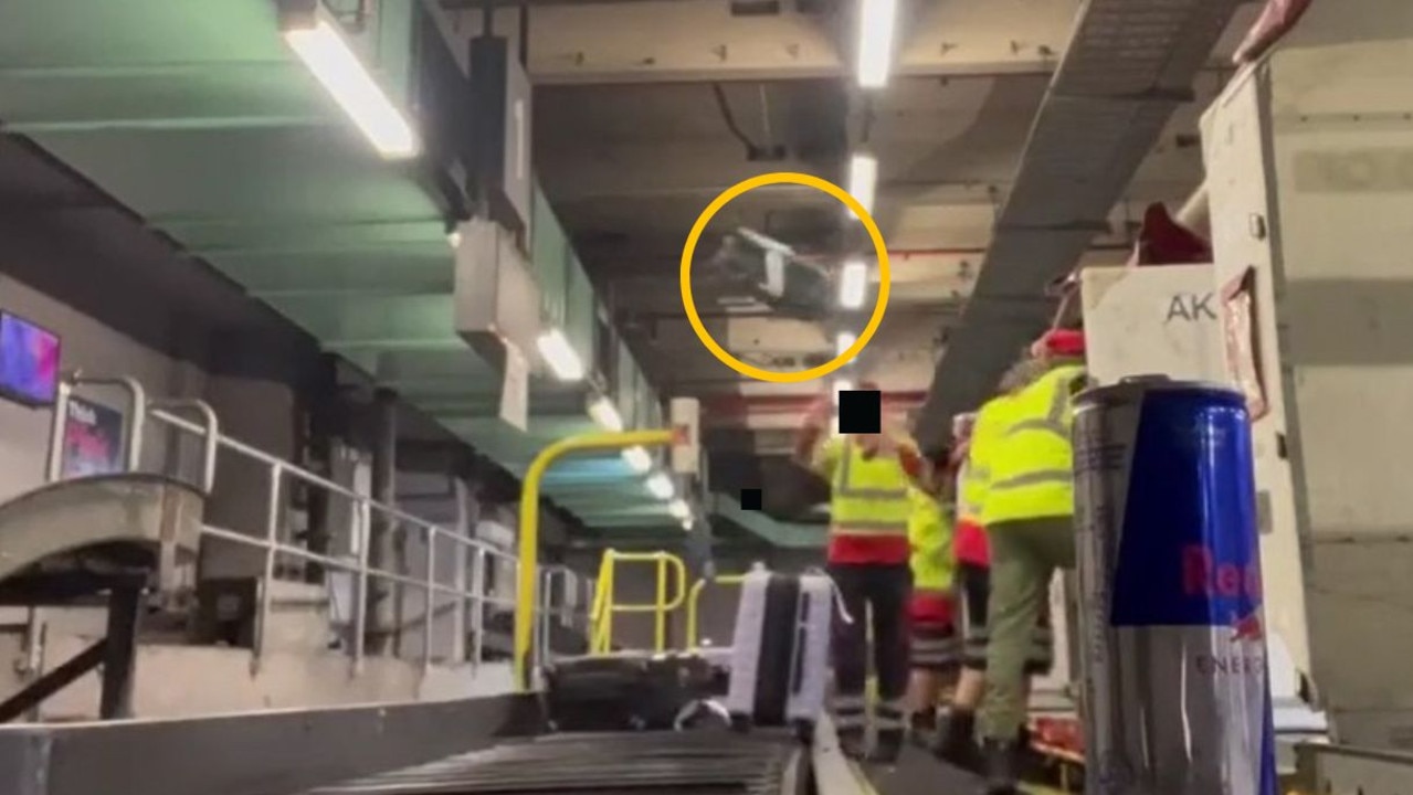 One of the baggage handlers was filmed throwing a bag a considerable distance.