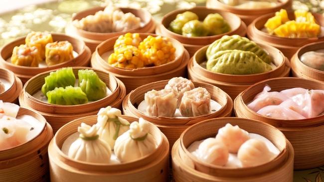 2. Make time for dim sum For a quintessential dim sum experience Neil takes us to the Luk Yu Tea House, one of the oldest restaurants in Hong Kong where the hustle and bustle are all part of the fun. As we squeeze around a table the lazy Susan is loaded up with dumplings and flaky barbecue pork buns, braised bok chop stems with hunks of garlic, a mixed platter of char sui pork, goose and duck, and so much more, all washed down with Tsingtao Beer. And just when we think we can’t eat another bite out come the egg tarts to prove us wrong. For an elevated dim sum experience Neil says to book ahead for a table at Lung King Heen. The first Chinese restaurant to be awarded three Michelin stars has secured a place in Neil’s heart and is home to the “delicate and amazing” dumplings that he loves to eat whenever he’s in Hong Kong. 