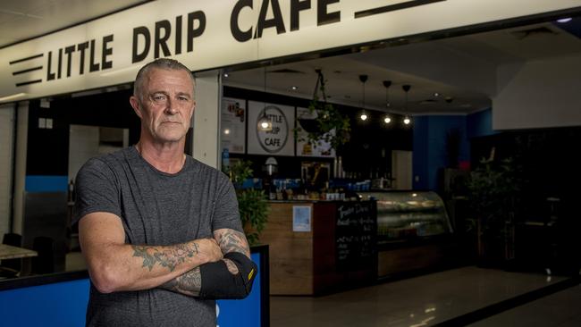 Little Drip Cafe owner Rob Lewis wants the body corporate at Ashmore Plaza to hurry up and agree to share security cost with other owner of the other side of the shops. Picture: Jerad Williams