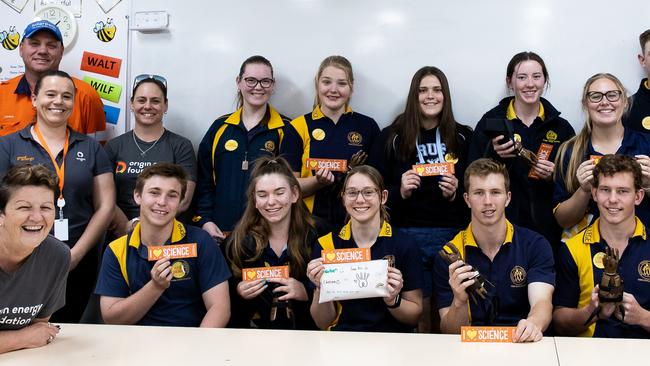 Students from Roma State College joined with Origin Energy Foundation volunteers assemble prosthetic hands. Photo: Origin Energy / Contributed