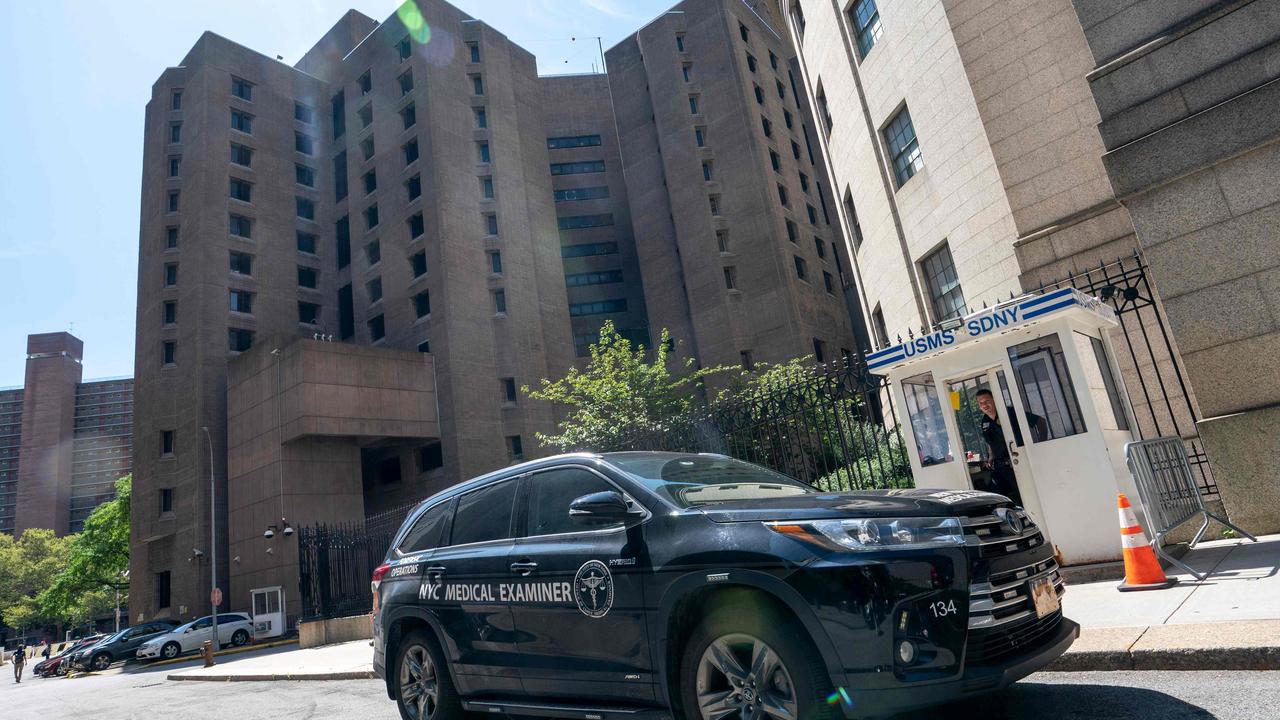 A New York Medical Examiner's car is parked outside the Metropolitan Correctional Center where financier Jeffrey Epstein died. Picture: Don Emmert / AFP.