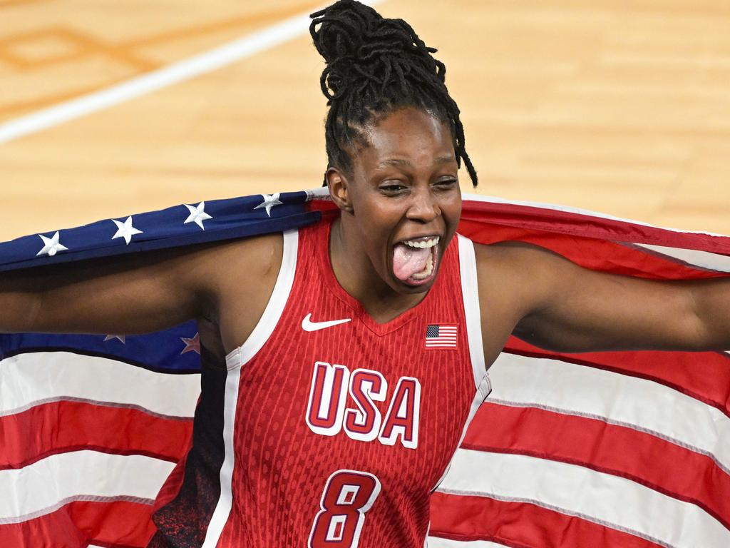 USA's #08 Chelsea Gray celebrates winning gold. Picture: Damien Meyer/AFP