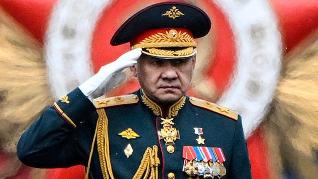 Former Russian defence minister Sergei Shoigu salutes soldiers as he is driven along Red Square during the Victory Day military parade in central Moscow last week. Picture: Alexander Nemenov / AFP