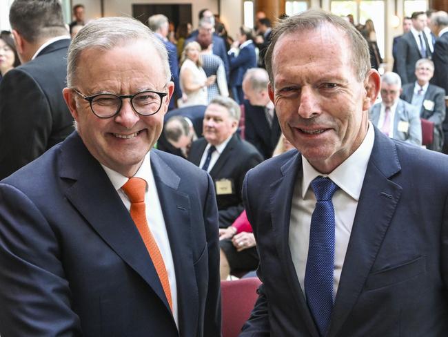 CANBERRA, AUSTRALIA - NOVEMBER 30:  Prime Minister Anthony Albanese and Tony Abbott attend the Portrait reveal in the Members Hall at Parliament House in Canberra. Picture: NCA NewsWire / Martin Ollman